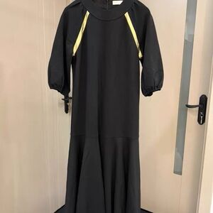 Elegant Black Dress with Yellow Accents